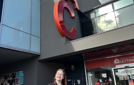 Amy Magnone, new book festival director stood infront of Lincoln Arts Centre.