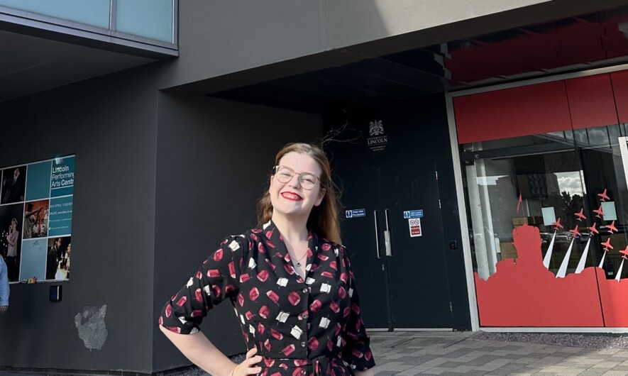 Amy Magnone, new book festival director stood infront of Lincoln Arts Centre.
