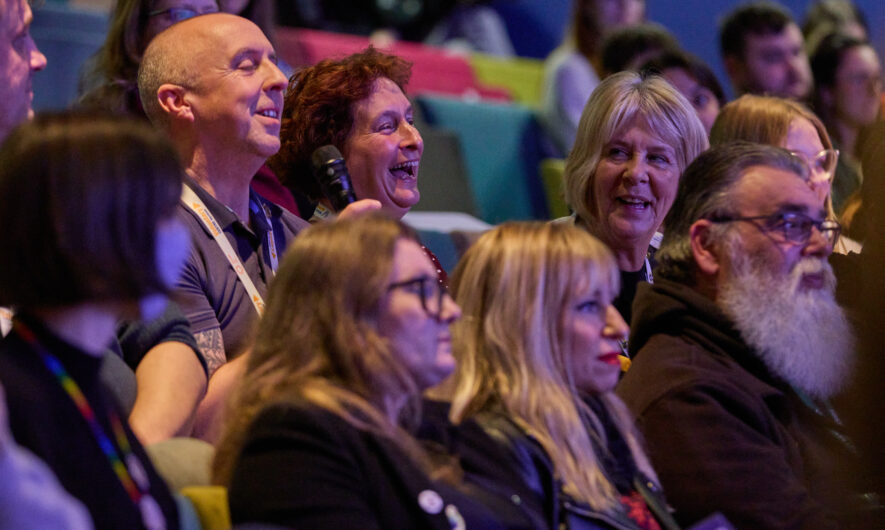 Audience members laugh in the Lincoln Arts Centre auditorium