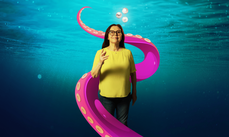 A person in an underwater world, being wrapped into a tentacle.