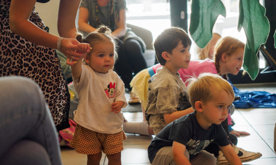 Young children gathered in the cafe area during Lincoln Family Fun Festival.