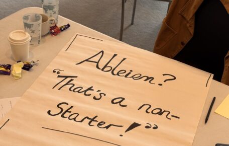 A large piece of paper on a table, with the words 